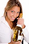 Young Lady Holding Champagne Bottle Stock Photo