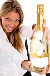 Young Lady Holding Champagne Bottle Stock Photo