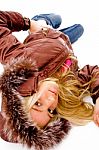 Young lady lying on floor Stock Photo