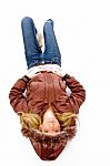 Young lady lying on floor Stock Photo