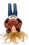 Young lady lying on floor Stock Photo