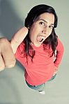 Young Lady Showing Thumbs Up Stock Photo