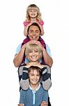 Young Lovable Happy Family Stock Photo