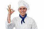 Young Male Chef Showing Ok Sign Stock Photo