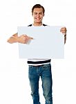 Young Male Holding Blank Board Stock Photo