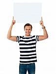 Young Male Holding Blank Board Stock Photo