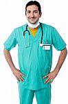 Young Male Physician Posing Confidently Stock Photo