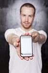 Young Male Showing Smartphone Stock Photo