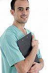 Young Male Surgeon with clipboard Stock Photo