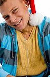 Young Male Wearing Christmas Hat Stock Photo