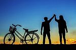 Young Man And Girl With The Silhouettes Stock Photo