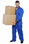 Young Man Carrying Cardboard Box Stock Photo