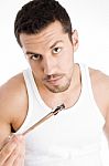 Young Man Eating Sushi Food Stock Photo