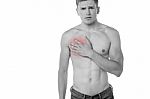 Young Man Having Chest Pain Stock Photo