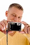 Young Man Holding Digital Camera Stock Photo