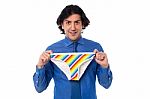 Young Man Holding Multicolored Underwear Stock Photo