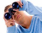 Young Man Looking Through Binocular Stock Photo