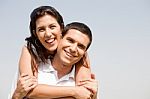 Young Man Piggyback His Girlfriend Stock Photo