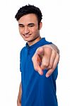 Young Man Pointing Finger At You Stock Photo