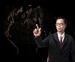 Young Man Pointing To World Digital Map Stock Photo