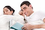 Young Man Reading Book Stock Photo