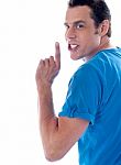 Young Man Showing Silent Gesture  Stock Photo