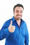 Young Man Showing Thumb Up Stock Photo