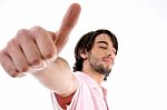 Young Man Showing Thumb Up Stock Photo