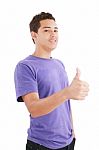 Young Man Shows Thumbs Up Stock Photo