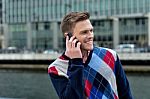 Young Man Talking On The Cell Phone Stock Photo