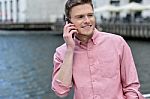 Young Man Talking On The Cell Phone Stock Photo