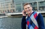 Young Man Talking On The Cell Phone Stock Photo