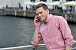 Young Man Talking On The Cell Phone Stock Photo