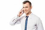 Young Man Talking On The Phone Stock Photo