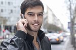 Young Man Talking With Cell Phone Stock Photo