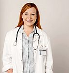 Young Pretty Smiling Female Doctor Stock Photo