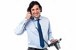 Young Professional Answering Phone Call Stock Photo