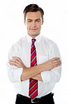 Young Professional Folded Arms Stock Photo