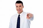 Young Smiling Businessman Pointing You Out Stock Photo