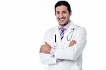 Young Smiling Confident Male Doctor Posing Stock Photo