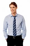 Young Stylish Smiling Sales Executive Stock Photo