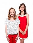 Young Teenage Sisters Standing Stock Photo