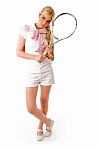 Young Tennis Player Carrying Racket Stock Photo