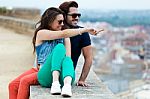 Young Tourist Couple Looking At The Views In The City Stock Photo