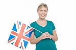 Young Uk Supporter Holding National Flag Stock Photo