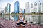 Young Woman Doing Yoga Exercises Stock Photo