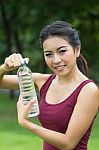 Young Woman Drinking Water Stock Photo