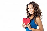 Young Woman Holding A Red Paper Heart Stock Photo