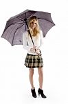 Young Woman Holding Umbrella Stock Photo