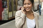 Young Woman In The City Stock Photo